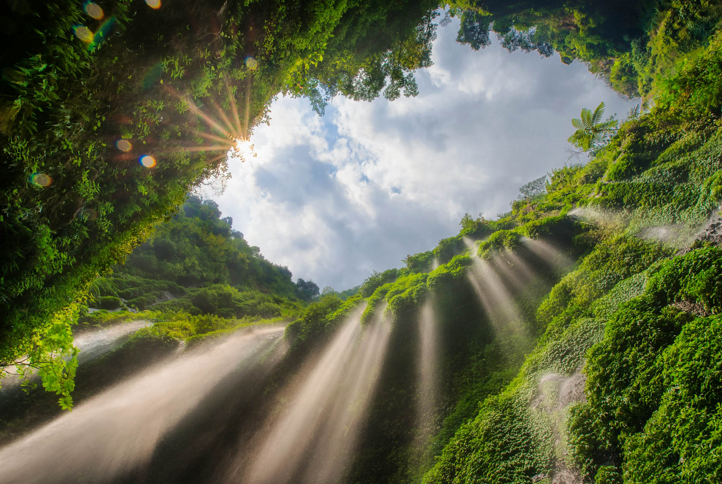 Filmmaker sends drone plummeting down a jungle  waterfall 